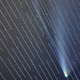 That bright white light in the middle is a Starlink satellite from SpaceX ruining the comet the photographer was trying to capture.